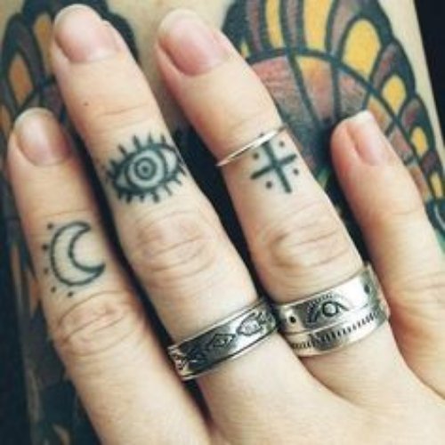 Moon and Horus Eye Tattoo On Finger